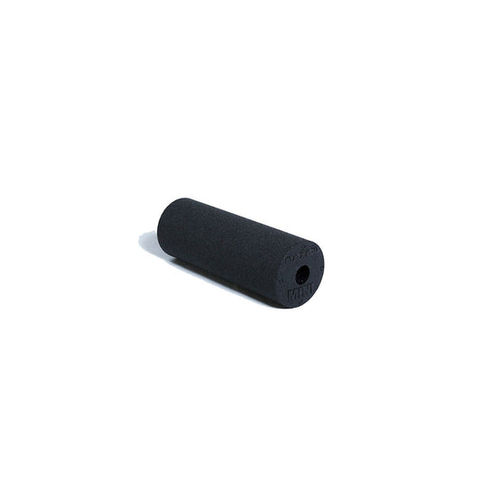 Blackroll mini used for massaging the foot and forearm