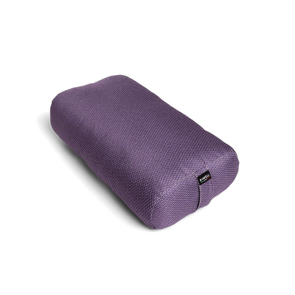 Cylindrical shaped yoga cushion for relaxing.