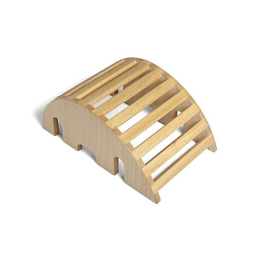 Wooden yoga arc that is smooth and helps gripping with hands and feet.